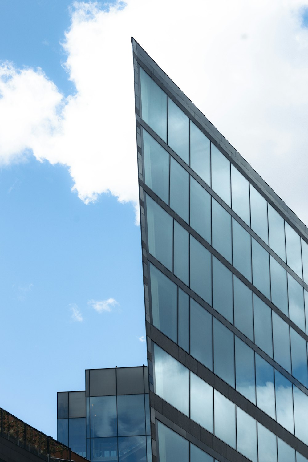 a very tall building next to a very tall building