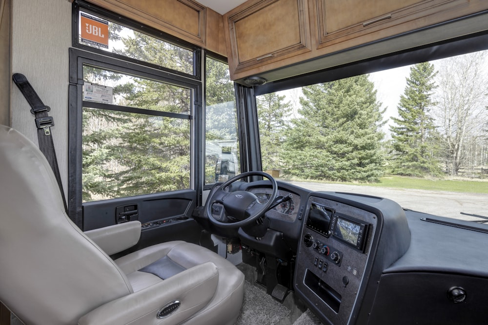 The interior of a bus with a large window photo – Free Calgary Image on  Unsplash