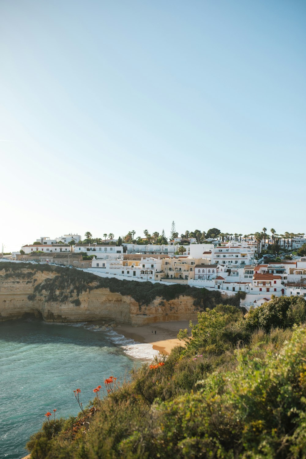 a view of a beach from a hill