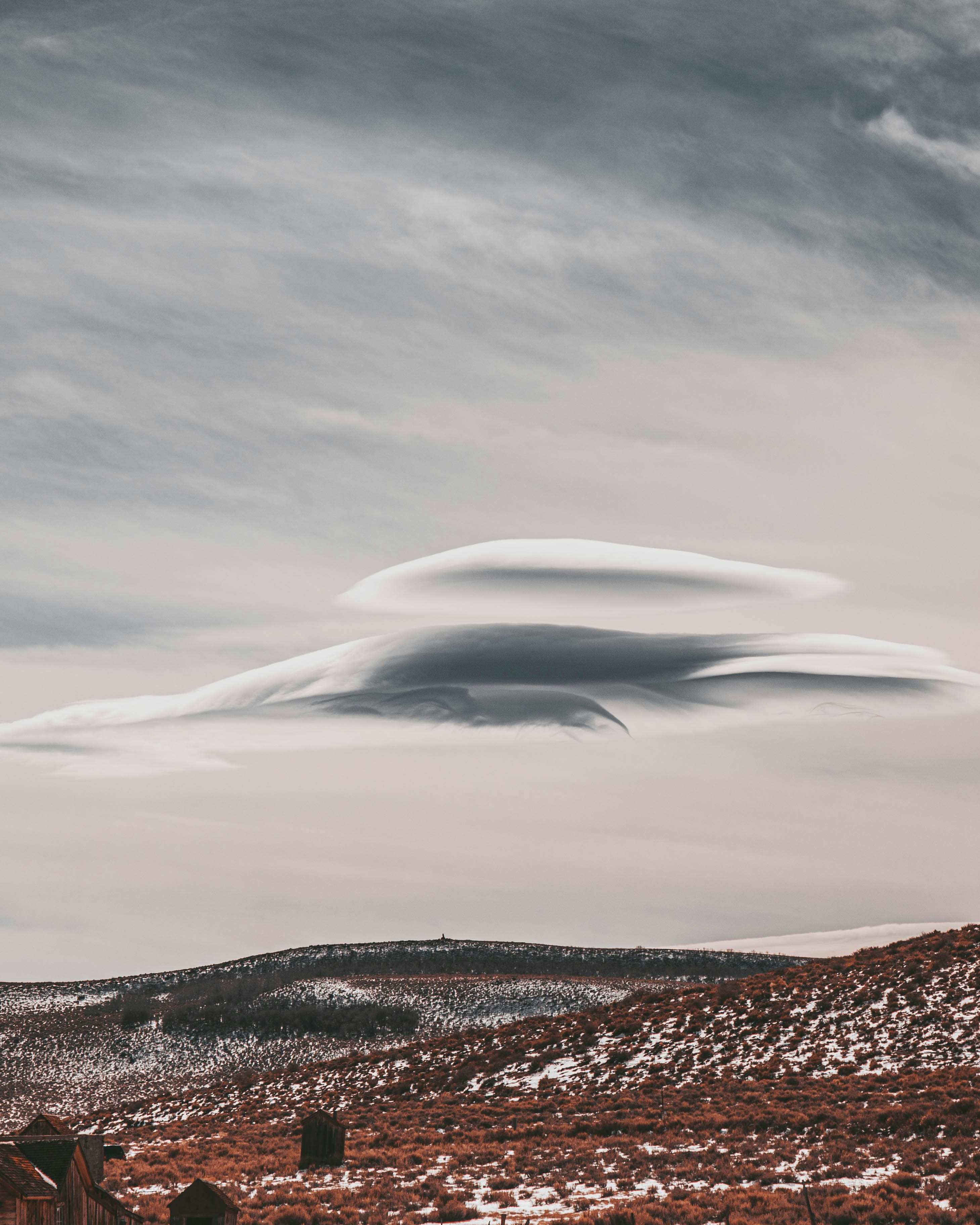 A large cloud is in the sky over a field photo – Free Cloud Image on ...