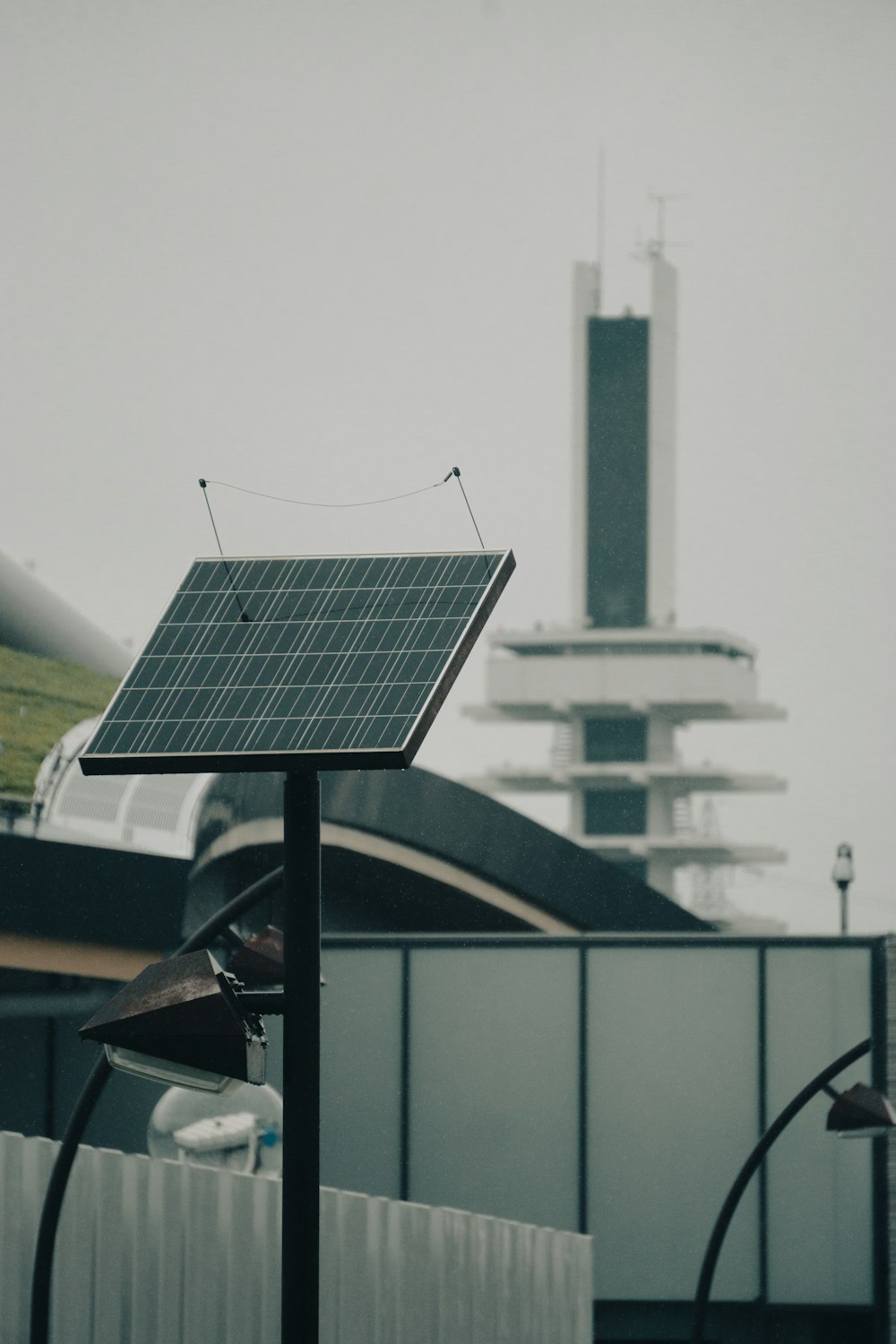 a solar panel on top of a pole