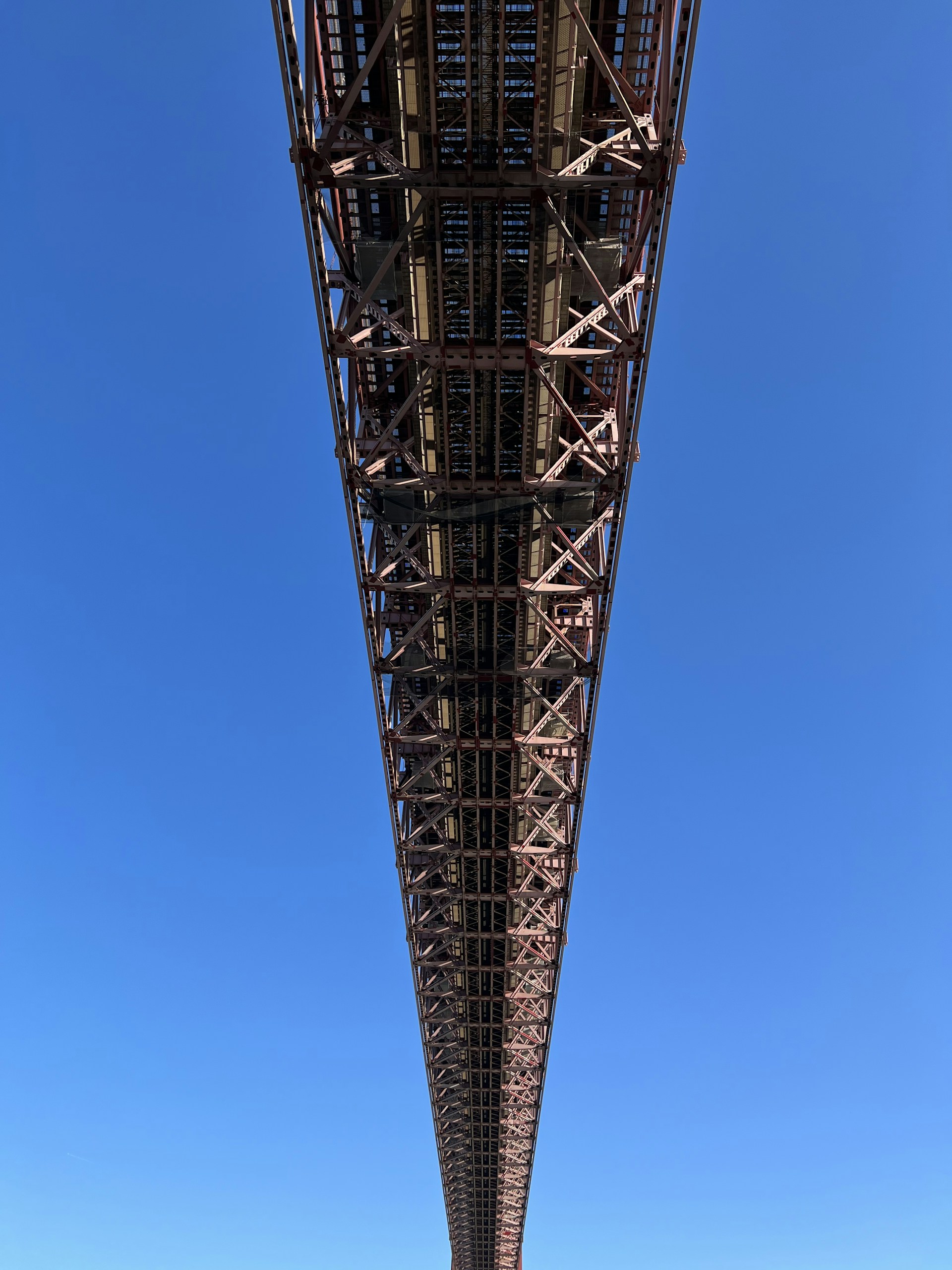 woman wearing yellow long-sleeved dress under white clouds and blue sky during daytime