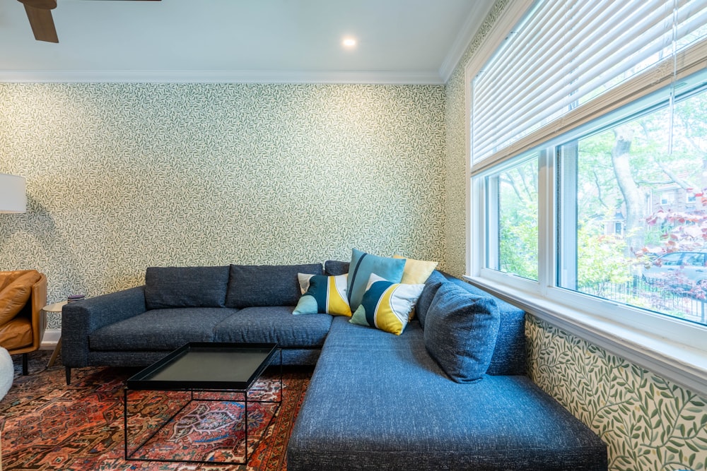 a living room with a couch and a table