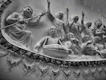 a black and white photo of a group of statues