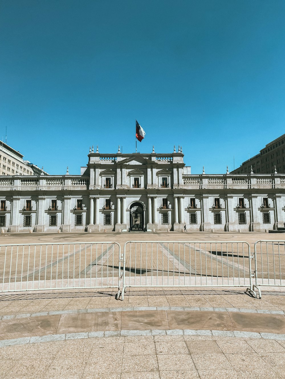 a large building with a flag on top of it