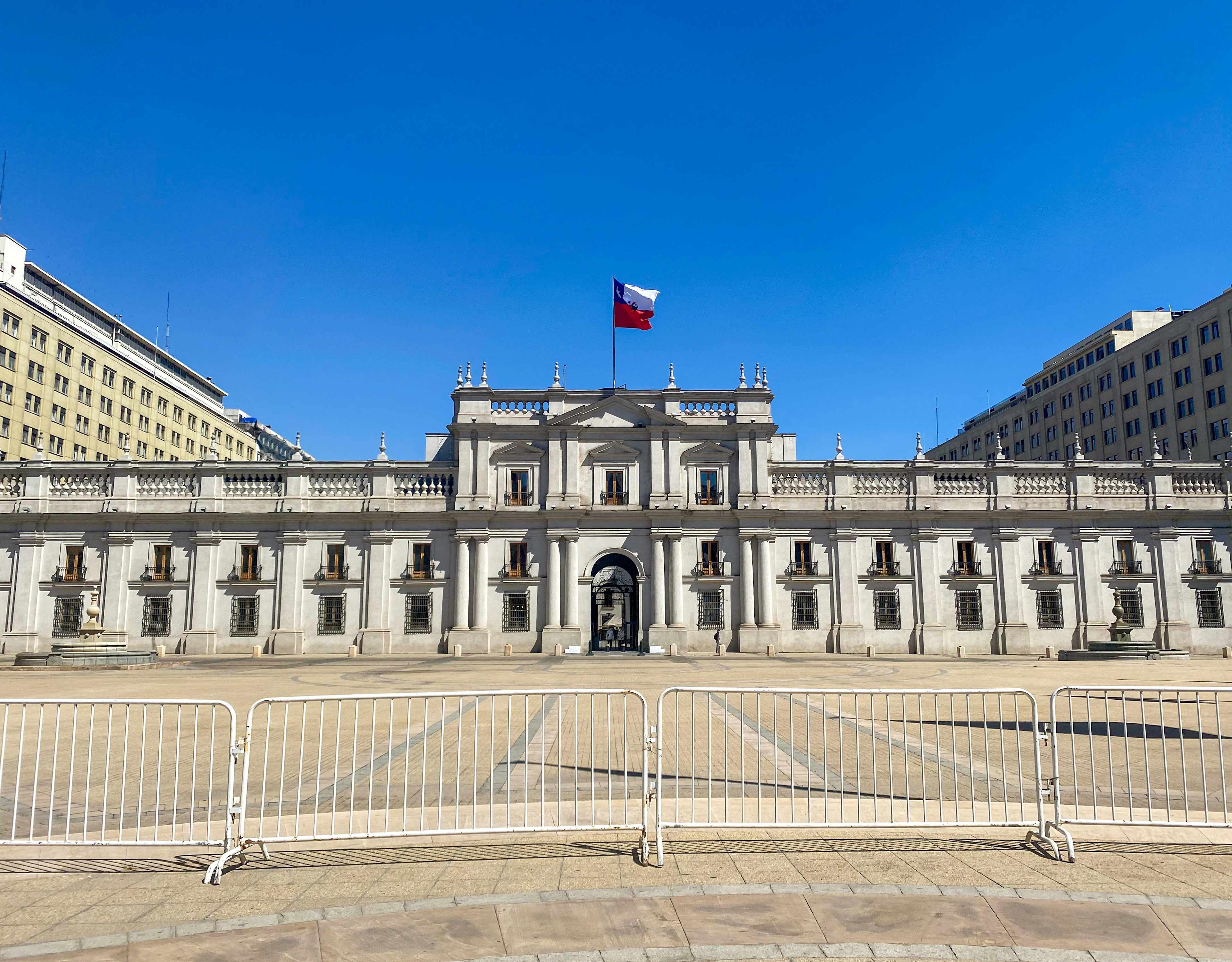 a large building with a flag on top of it
