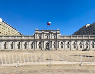 a large building with a flag on top of it