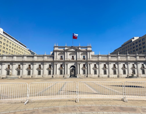 a large building with a flag on top of it