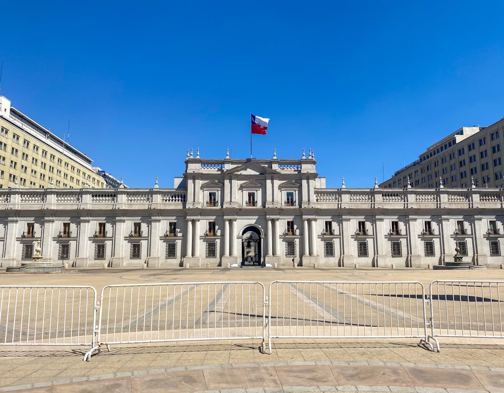 a large building with a flag on top of it