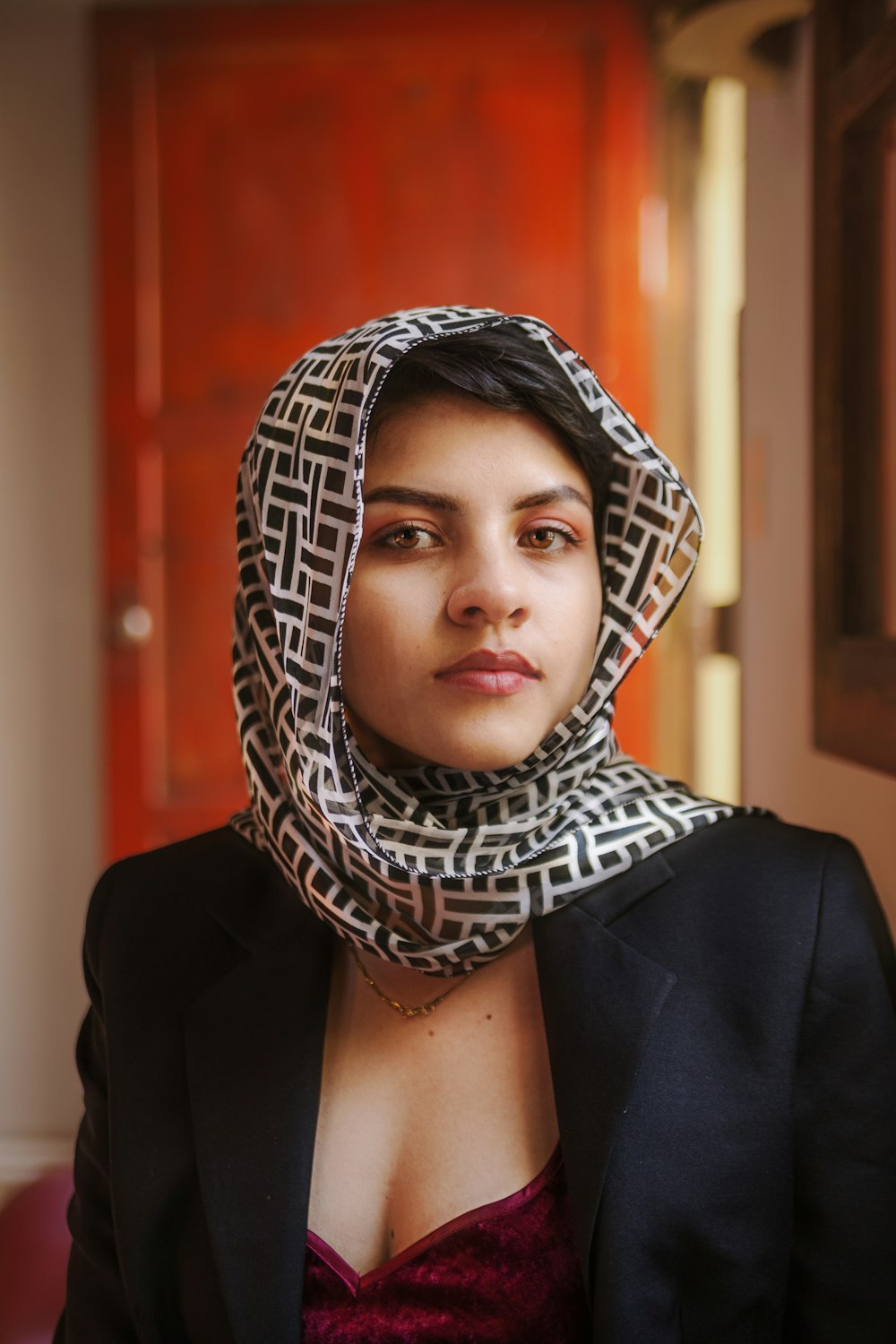 a woman with a scarf around her head