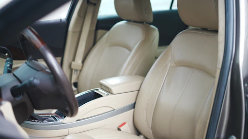 the interior of a car with a steering wheel