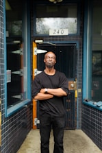 Private client entering a biometric-secured vault room with a confident expression.