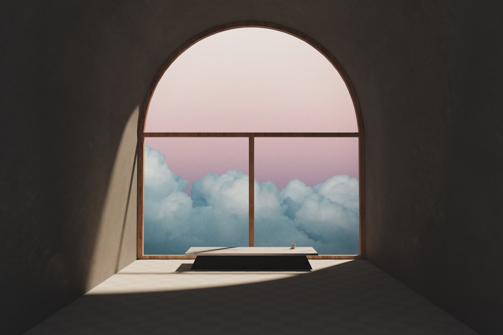 une fenêtre avec vue sur les nuages à l’extérieur