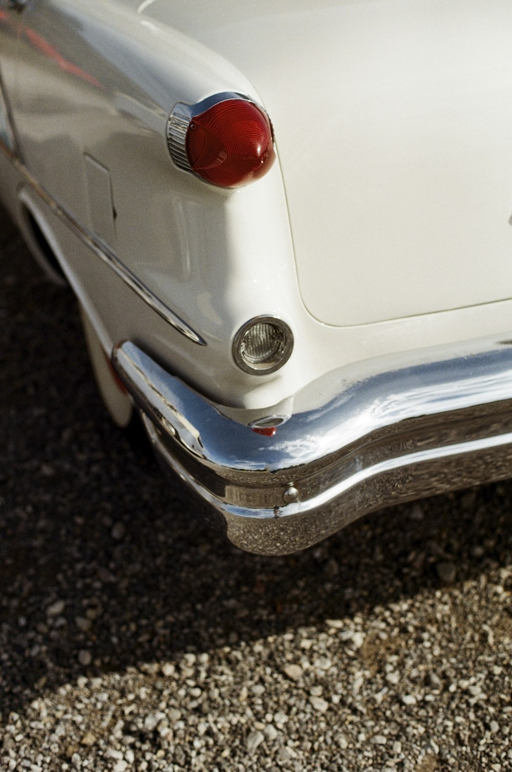 a close up of the tail end of an old car