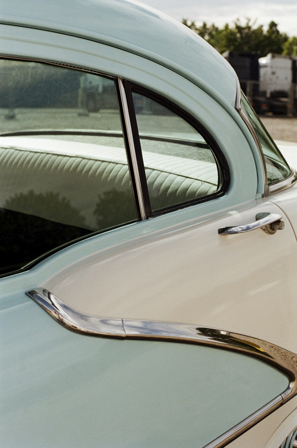 a close up of a car door handle on a car