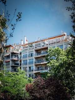a tall building with balconies and balconies on top of it