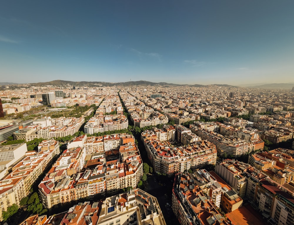 an aerial view of a city with lots of buildings