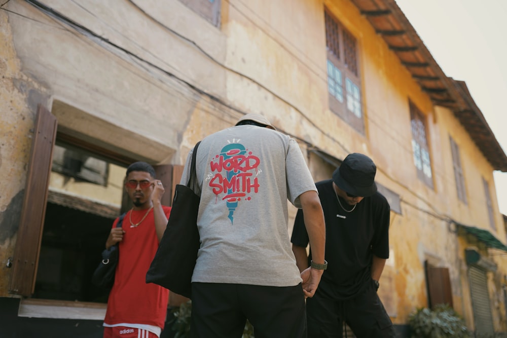 a group of young men walking down a street