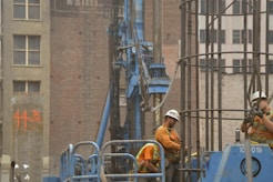 a couple of men standing next to each other