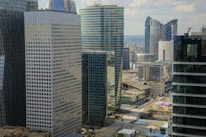 a group of tall buildings in a city