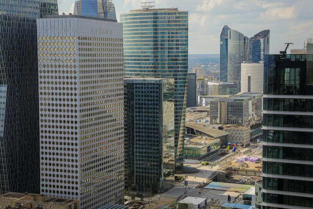 a group of tall buildings in a city