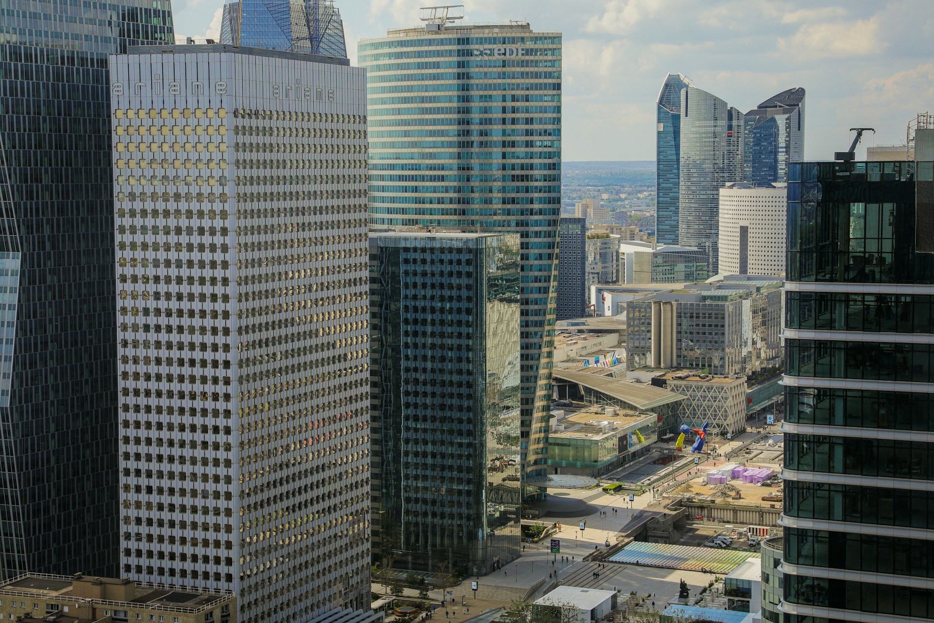 a group of tall buildings in a city