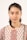 a woman with a braid wearing a dress