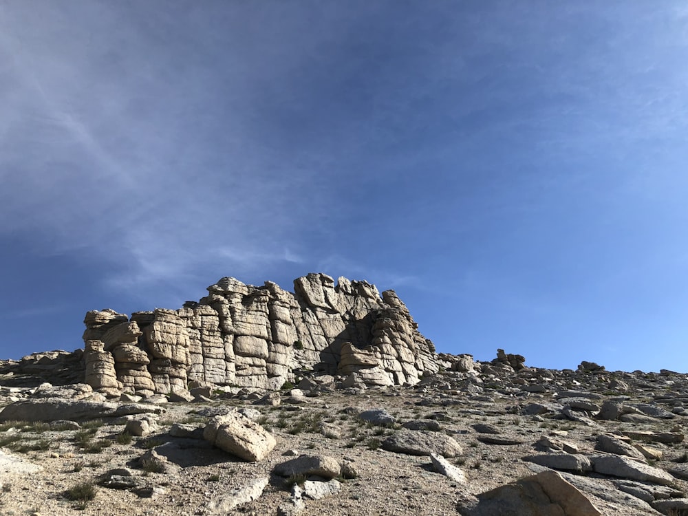 a large rock formation on top of a mountain