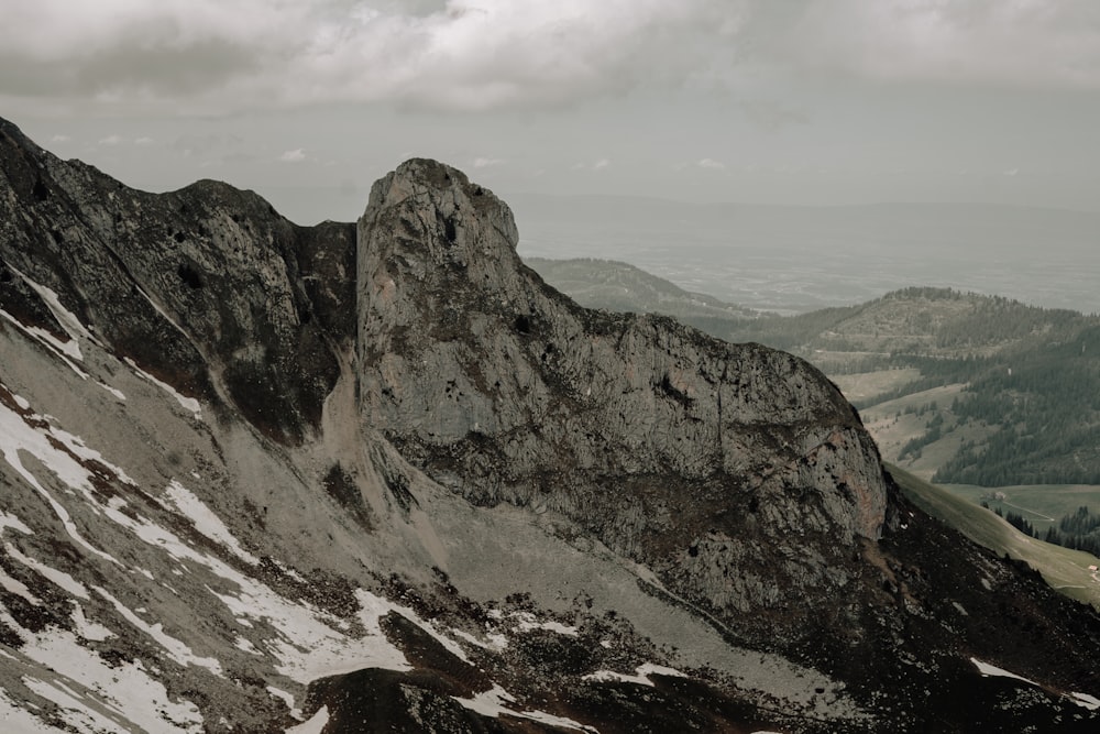 a view of a mountain with snow on it