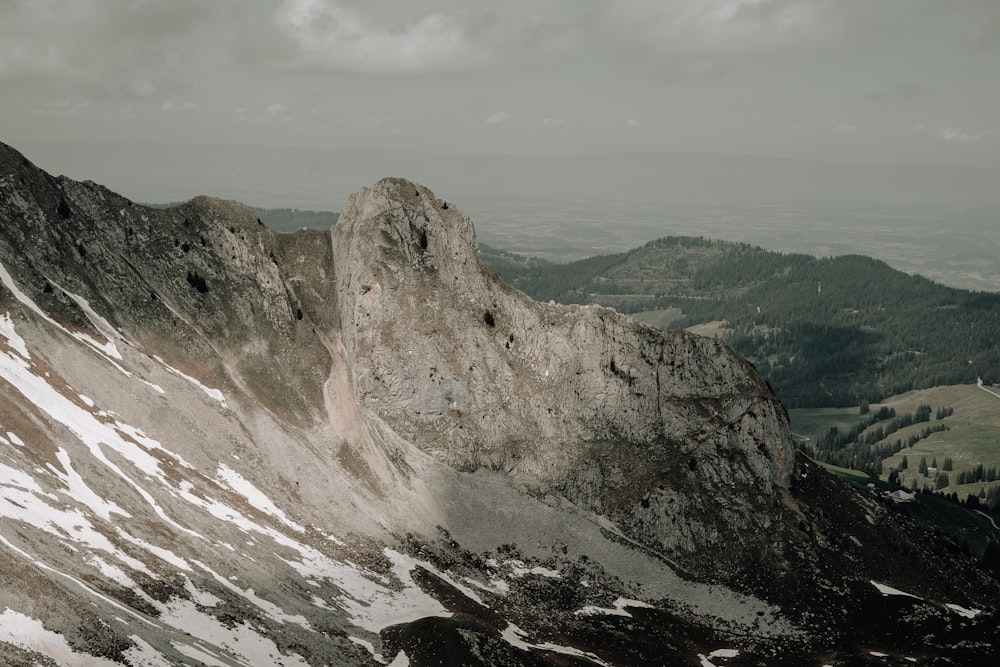 a view of a mountain with snow on it