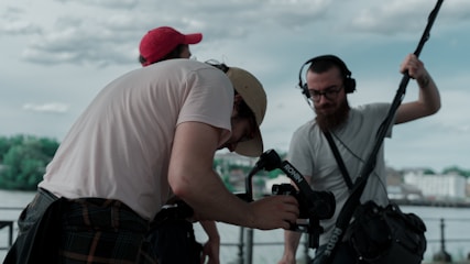 a couple of men standing next to each other