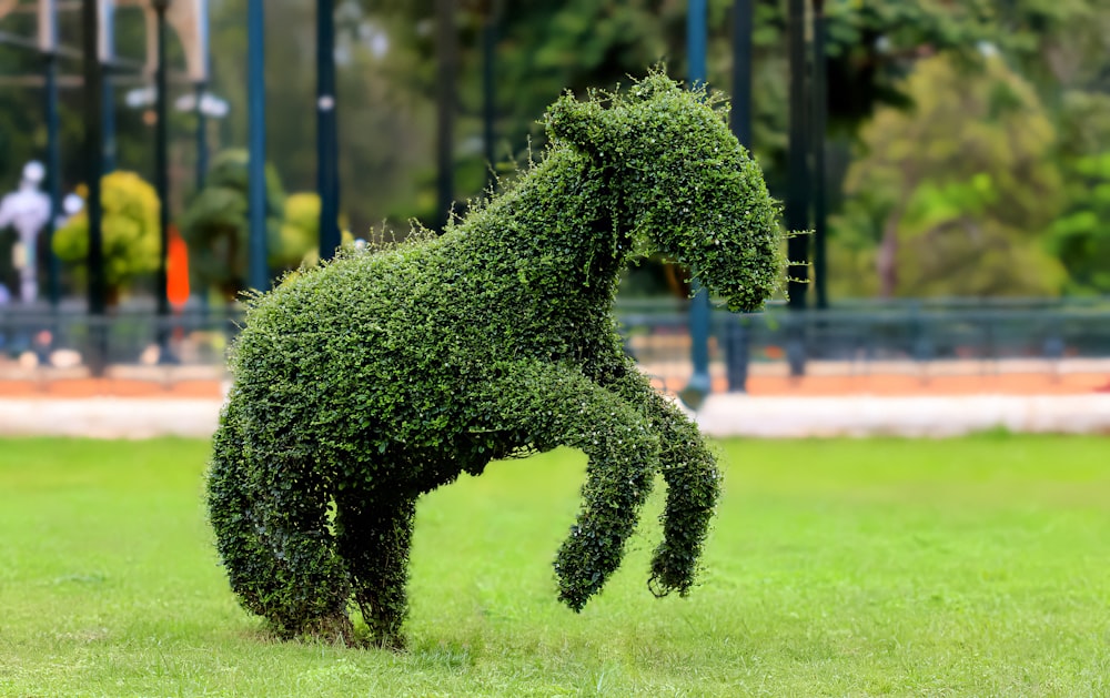 a sculpture of a horse made of grass