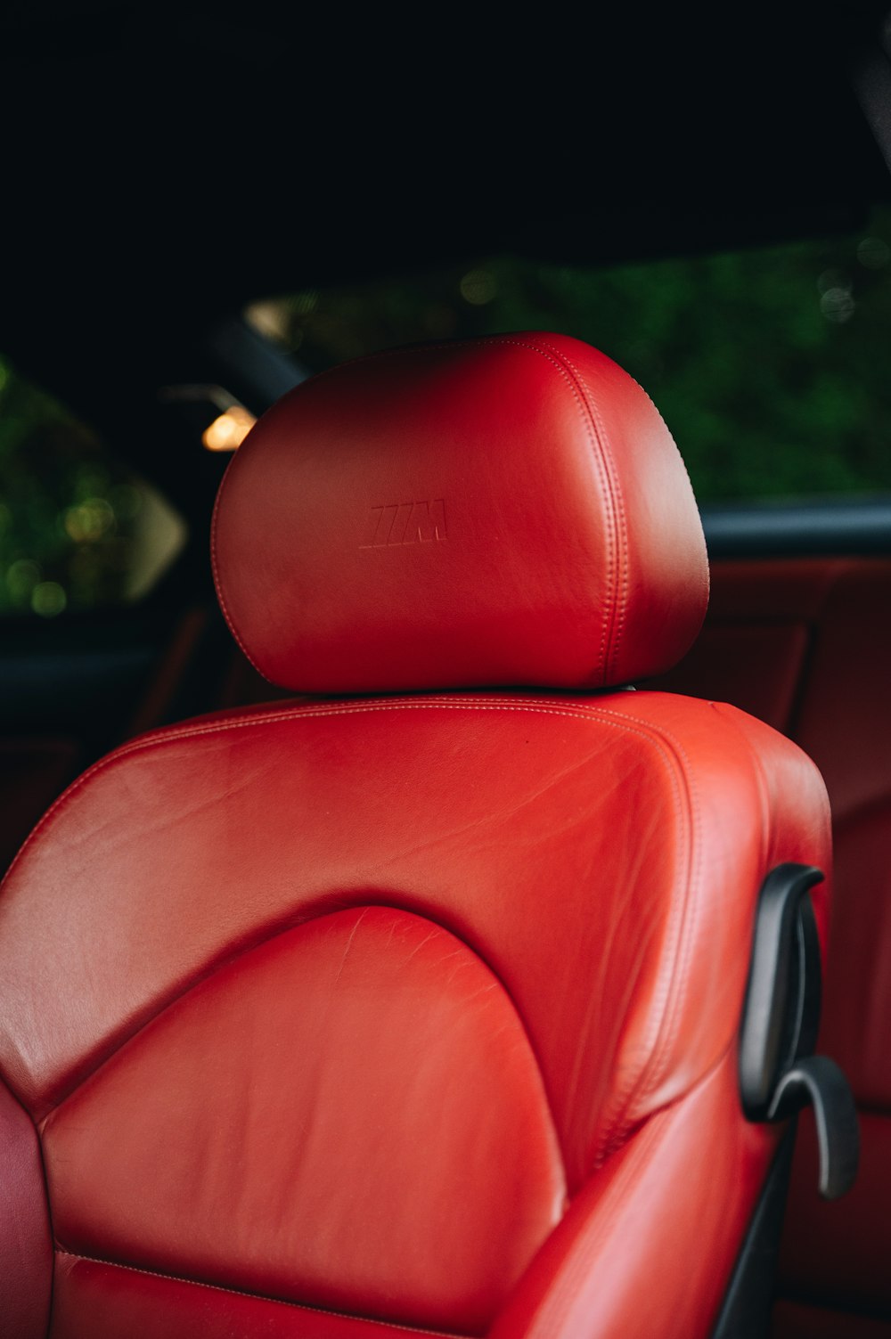 a red leather seat in a car