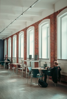 a person sitting online     mba program