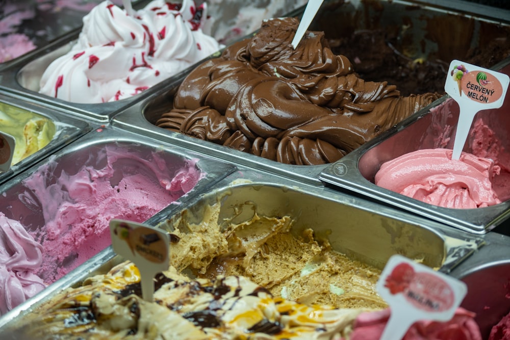 a variety of ice creams are in trays