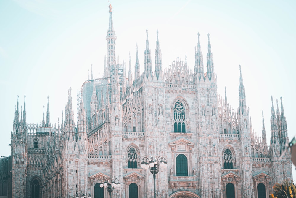 a large cathedral with a clock on the front of it