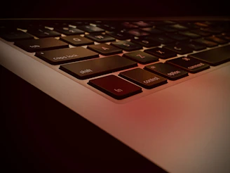 Top-down shot of a keyboard with some keys slightly yellowed from age.