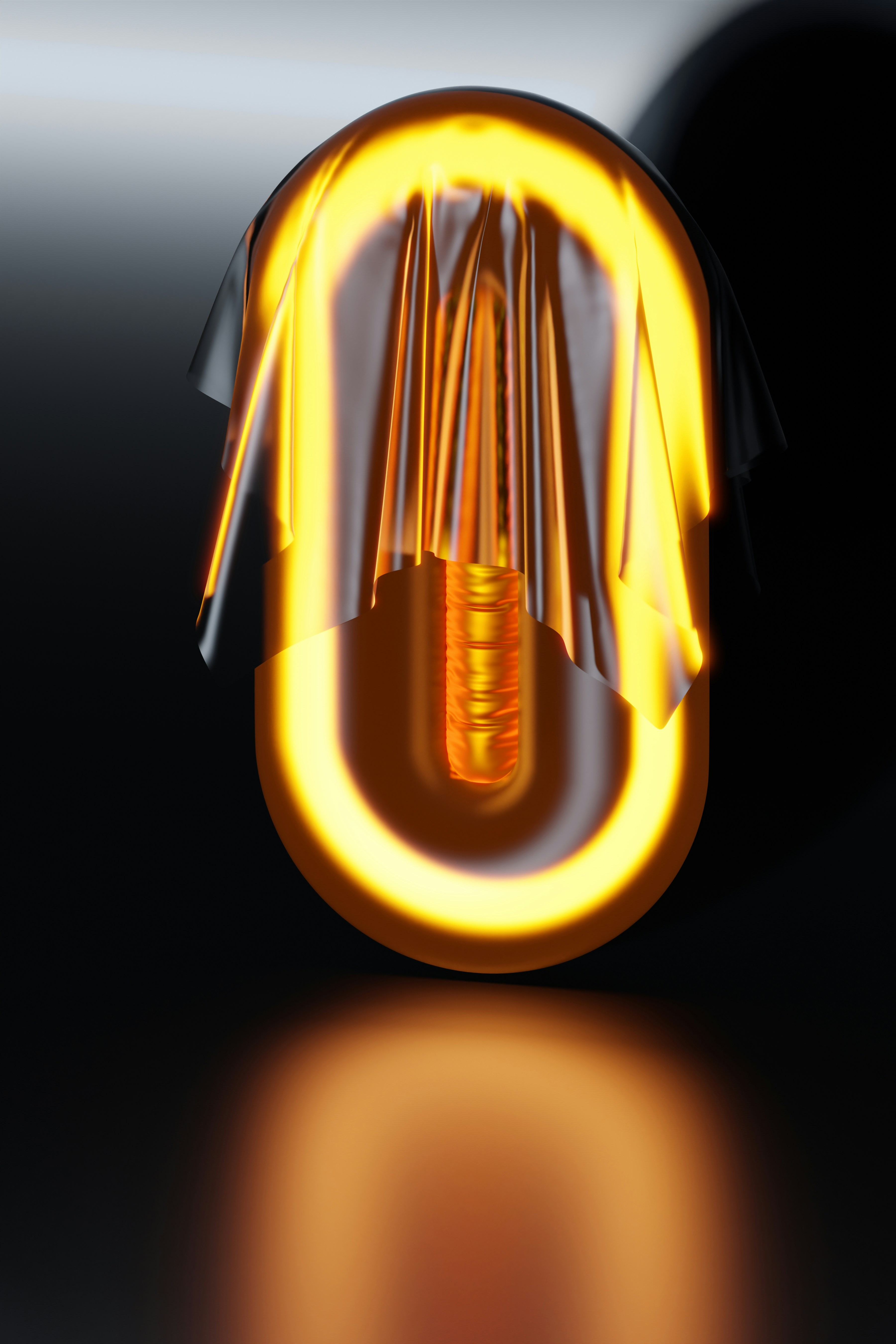 a yellow light bulb with a black background