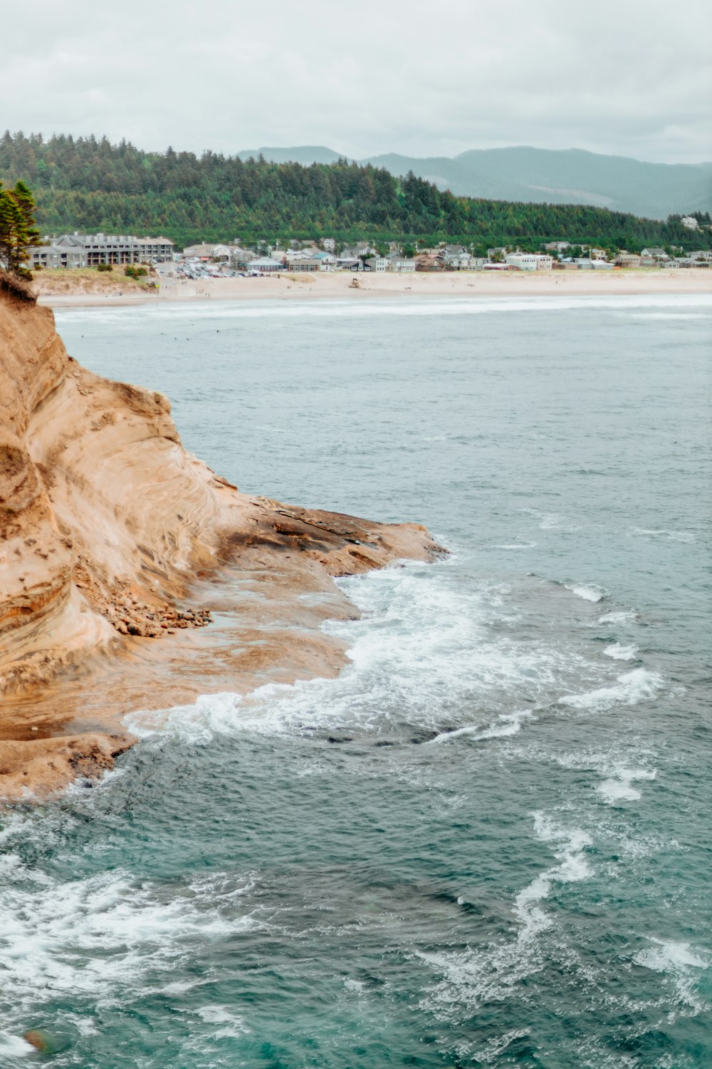 a view of the ocean from the shore of a beach