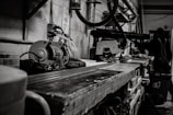 A workshop scene with machinery and tools in use.