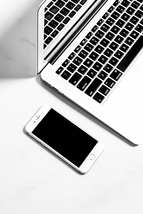 Laptop and smartphone gadgets on a desk