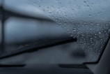 rain drops on the windshield of a car
