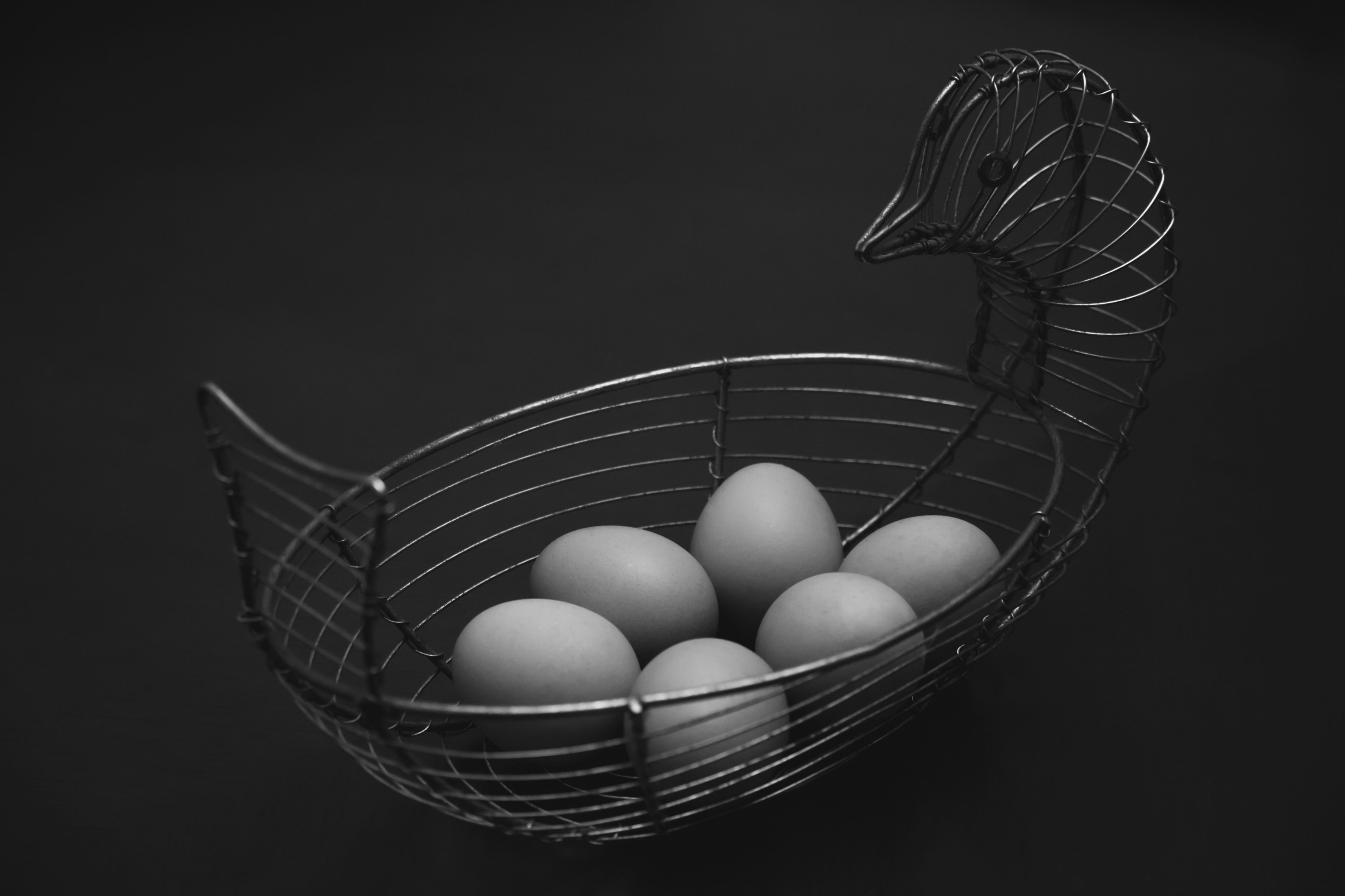 Metal basket with eggs