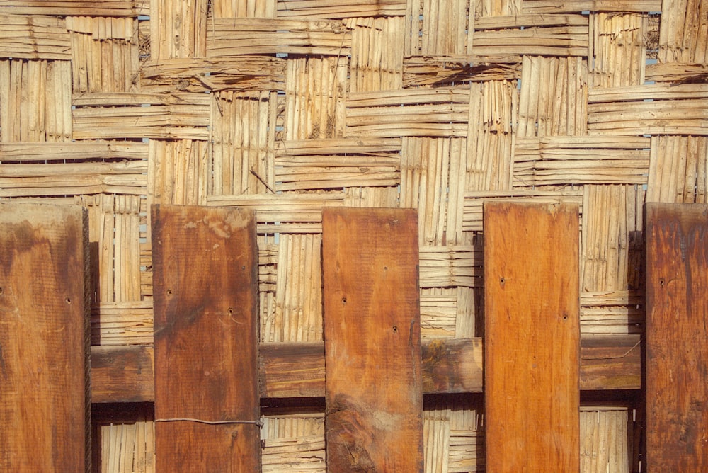 a close up of a wall made of wood planks