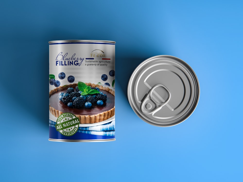 a can of blueberry filling next to a can of blueberries