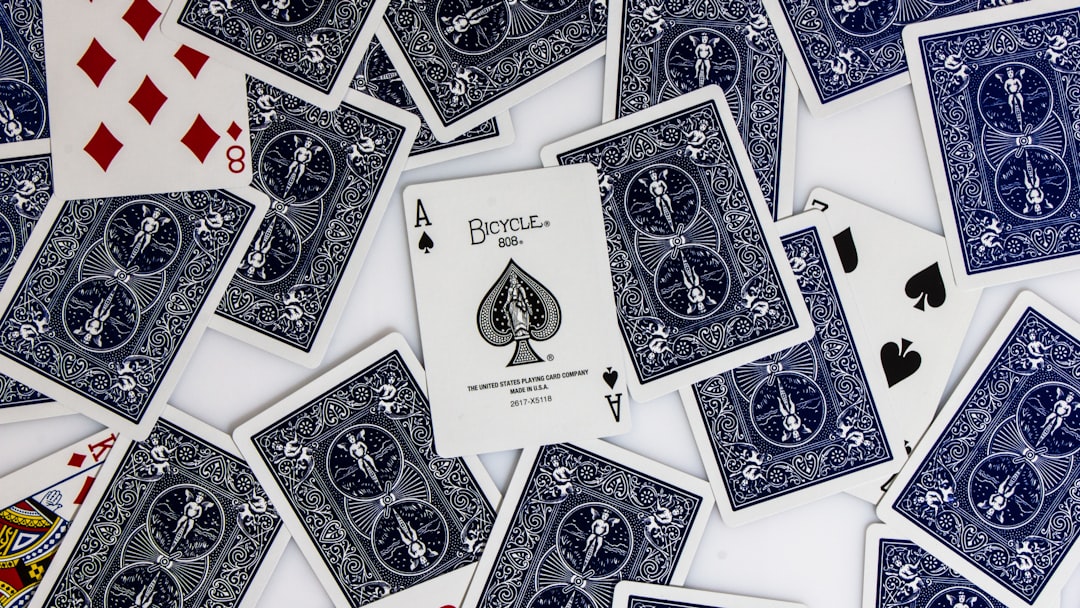 a pile of blue and white playing cards