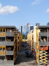 Construction site with workers building a modern residential complex