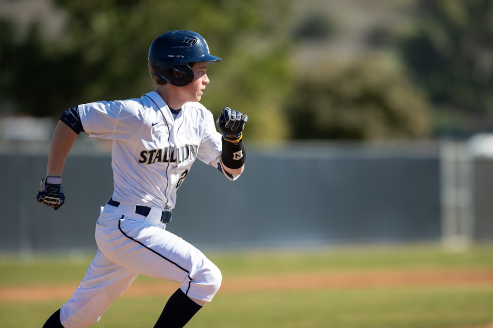 a baseball player running on a baseball field