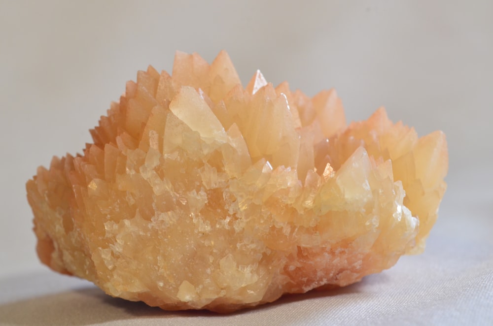 a close up of a rock with a white background