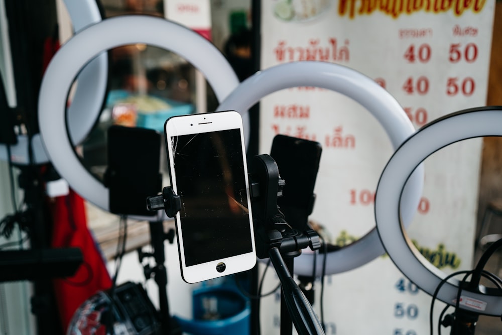 a cell phone is sitting on a tripod